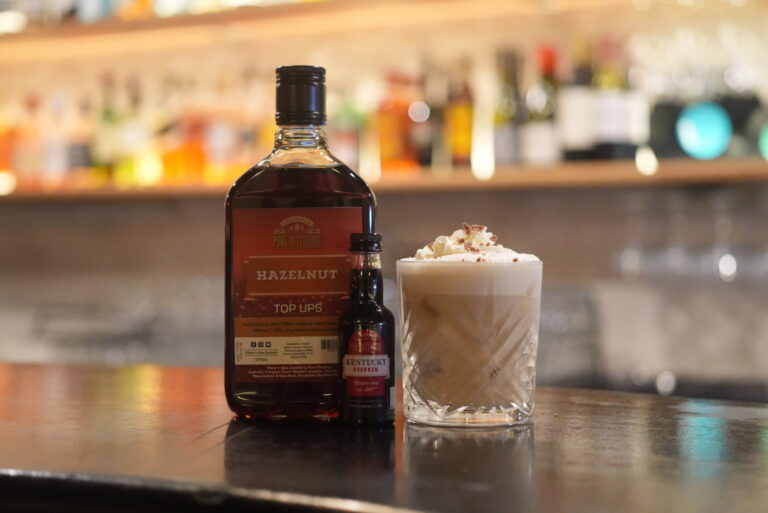 Hazelnut liqueur and bourbon cocktail on bar